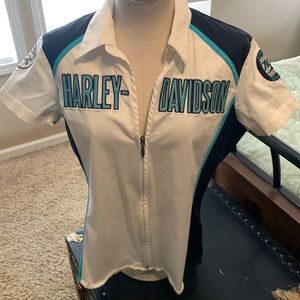 Harley Davidson Shirt/Vest with black and teal logos. Zip up v neck . Very nice